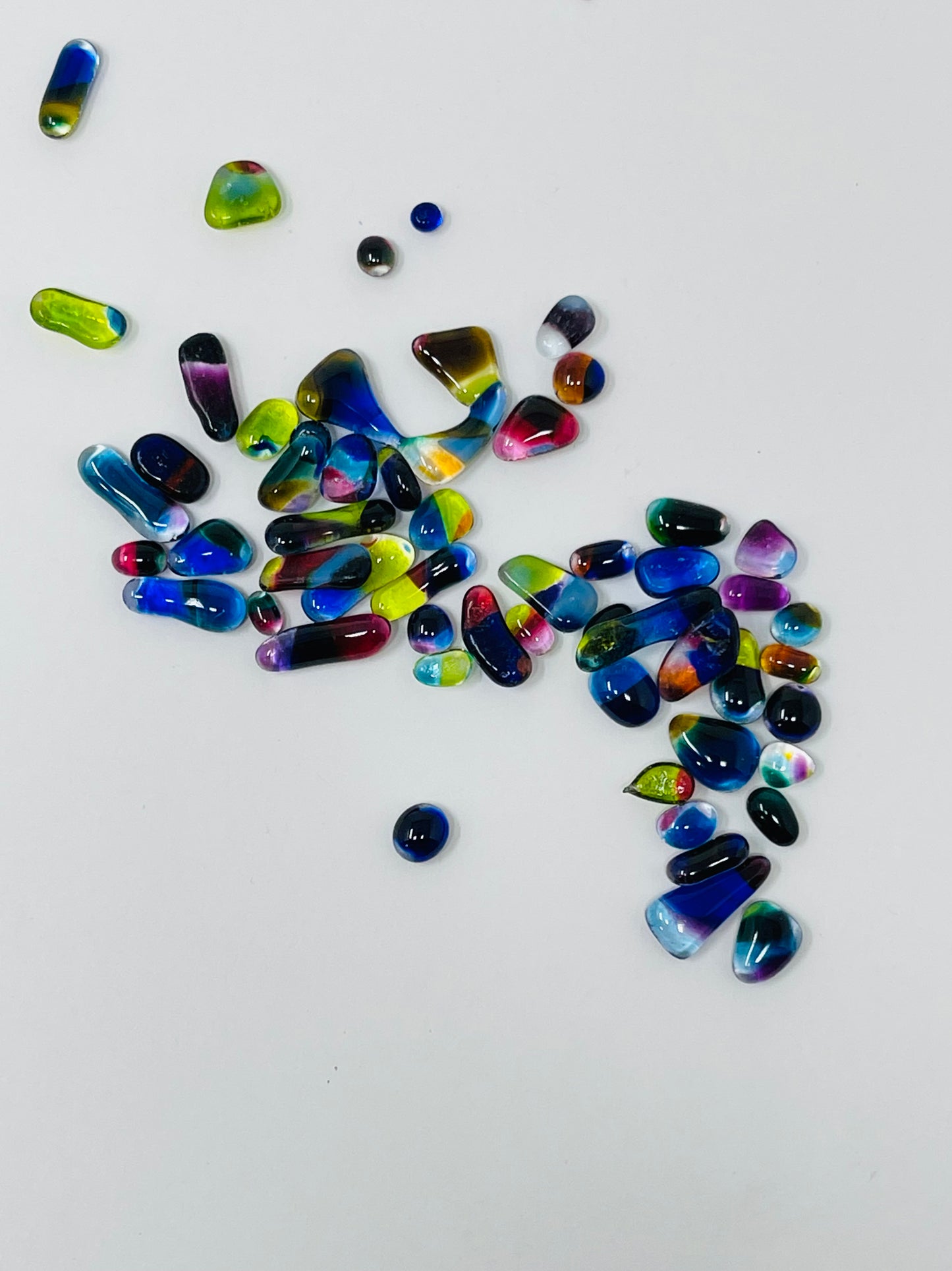 Wedding glass shards transformed into pear-like jewels for mezuzah