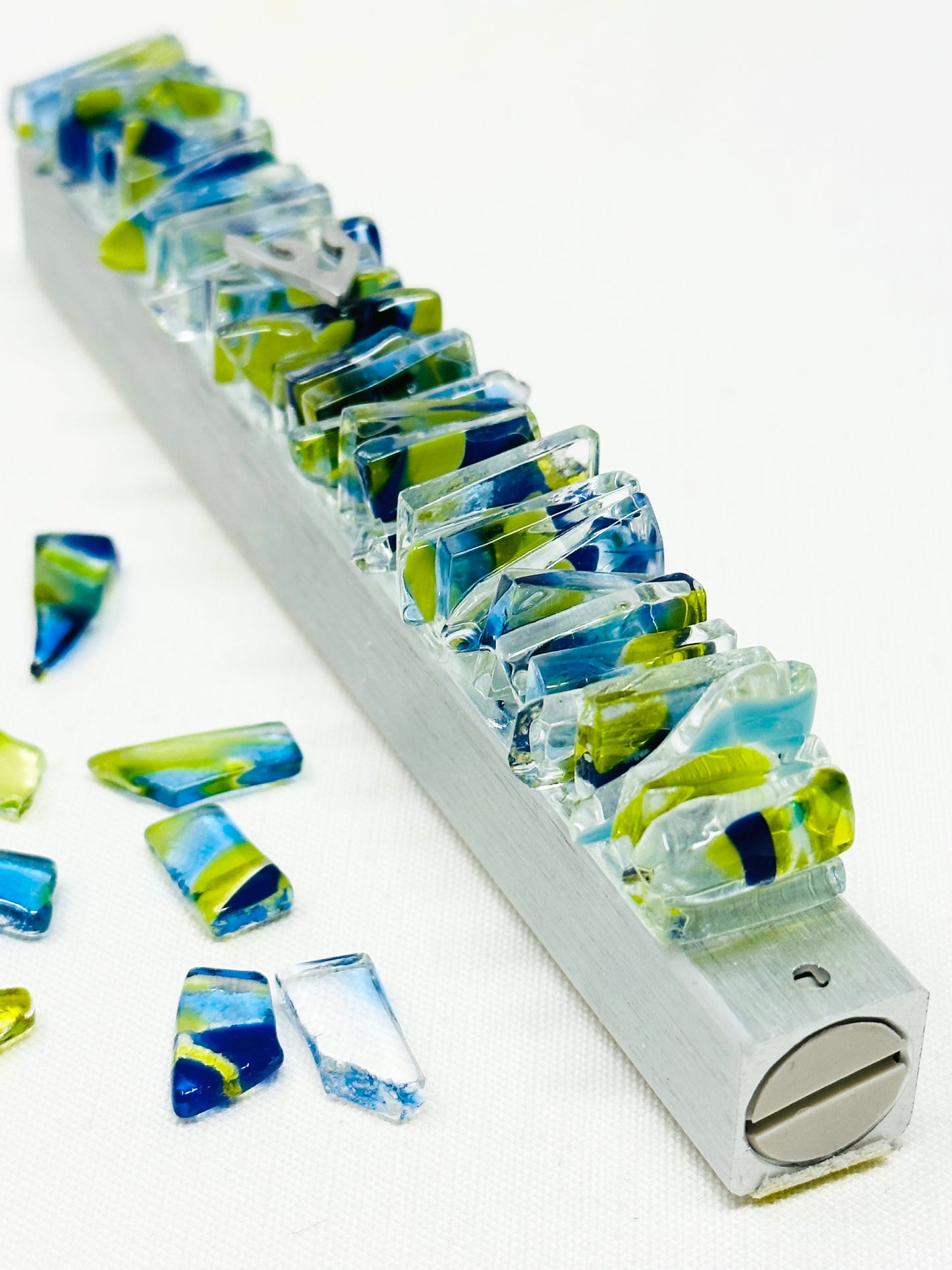 Vertical mezuzah designed with Multicolour blue glass shards