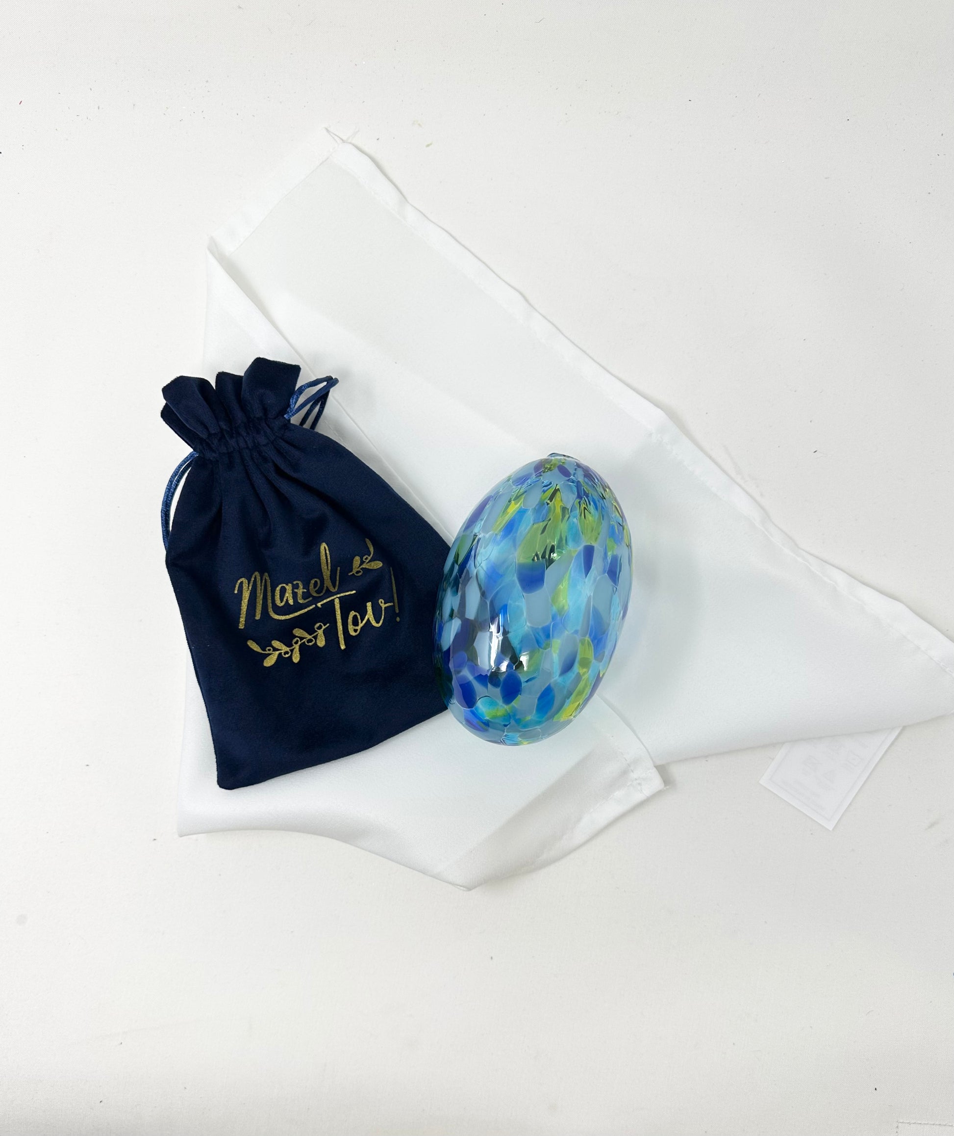 Multicolour wedding glass for Jewish wedding. Blue velvet bag with Mazel Tov wording in gold stamp.